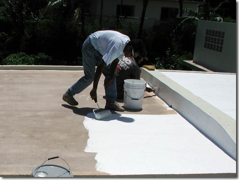 Roofer installing slate roof in New Straitsville, OH.