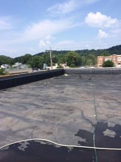 Before of Bench Mark Coating a Commercial Roof at Elizabeth Chapel Church in Gallipolis, OH. 