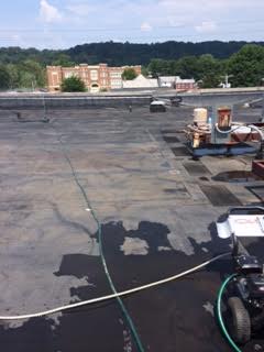Before of Bench Mark Coating a Commercial Roof at Elizabeth Chapel Church in Gallipolis, OH. 